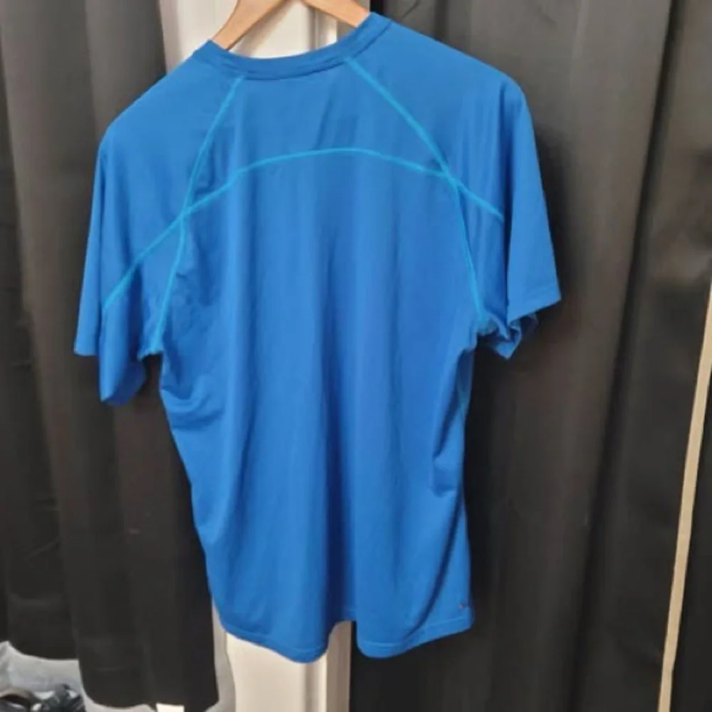 The North Face Men’s Electric Blue Short Sleeve Swim Rash Guard